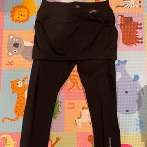 Authentic new with tags Skechers black running pants with outer skirt size S